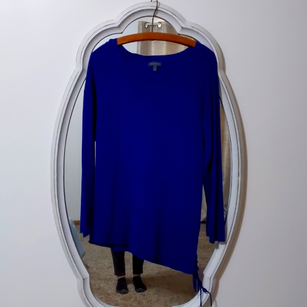 The Limited blue asymmetrical sweater. Size small. Tie detail on the side.